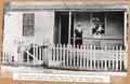 The Wickman home on Fourth Street before the Fire of 1891 - Near Auditorium, Mary Elizabeth Wickman holding baby, Henrietta (Mrs. Chas. Swinford) - 1882