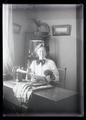 Maud Bohlman at a sewing machine
