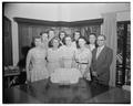 Business Education staff posing with a cake