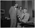 Professor Herbert Nelson and Miss Phyllis Grant present a barometer clock to President Strand on behalf of the men's and women's faculty clubs on Dr. Strand's 10th anniversary as president of OSC, October 1952