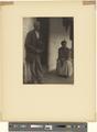 African-American woman and man on porch [b009] [f000] [004] (recto)