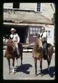 Al Oliver and Dean Wilbur Cooney riding out of Horse Barn for the last time, Oregon State University, Corvallis, Oregon, May 1971