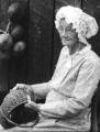 Woman making basket