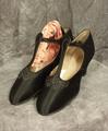 Shoes of black satin with tiny black cut beads in a bi-scallop design on vamp