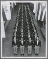 Men's Glee Club posing in the Memorial Union, 1957-1958