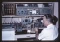 Joe K. Park with electronic laboratory equipment, 1967