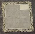 Handkerchief of white cotton batiste with a fine lace knit border