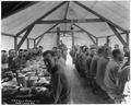 Soldiers of US Army's Spruce Production Division eating a meal inside mess hall