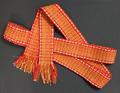 Tie Belt of red-orange, yellow and white woven cotton with metallic threads