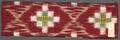 Textile Panel of deep red cotton with Ikat woven designs of small double Ikat squares
