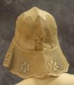 Cloche hat of woven straw in a net weave with flower motif pattern
