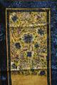 Textile panel of gold silk with colorful embroidery of Chinese flowers and butterflies