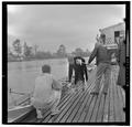 Mothers Club officers christening an OSU crew shell, May 1963