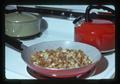 Fried potatoes in pan on stove, 1975