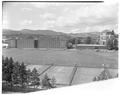 View of Weatherford Hall dorm complex and tennis courts looking north, June 1957