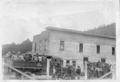 People standing outside a country store