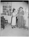 Mrs. Charlene Edwards of Philomath, State President Business and Professional Women, gives scholarship to Filipino student in Home Economics, January 1950