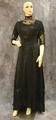 Tea gown of black cotton batiste with high band neckline and yoke of tulle lace
