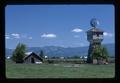 Old barn and windmill near Harrisburg, Oregon, May 1974