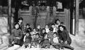 Chinese children and teachers in front of playroom