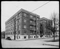 Wellesley Court Apartments, Portland, at corner of East 15th and Belmont. Power pole and street in foreground.