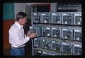 Director Bob Lindsey with rat cages, Oregon State University, Corvallis, Oregon, 1975
