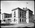 Corner view of Customs House at N. 8th and Davis, Portland. Street in foreground.