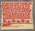 Textile Sampler of off-white linen with red woven bands in floral motifs