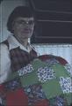Mrs. Locke with patch quilt