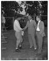 Coach Kip Taylor, Ted Mesang, Band Director, and Bob Walls, Head of Music Department, September 1949