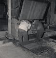 Two Workers Closing Burlap Hop Bale 6