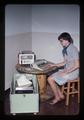 Nan Scott with HP calculator, Mettler P515 scale, and generator, Oregon State University, Corvallis, Oregon, 1977