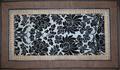 Textile panel of blue silk satin with black cut velvet pile of flowers and leaves