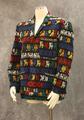 Jacket of black cotton with rows of geometric designs in red, yellow, white, orange, blue and green