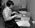 Student at work on the Recordak Microfilm machine