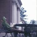 Studying with a cup of coffee outside of the Memorial Union