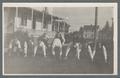 Oxford Club members posing in mock football formation, 1913