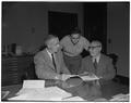 George A. Syriotis, editor of To Vima, (Athens, Greece newspaper) at right with son Toney, OSC Electrical Engineering sophomore, and President Strand. May 1, 1952