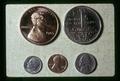 Closeup of US cent and Canada nickel, Salem, Oregon, 1973