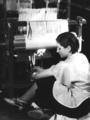Weaving Room, Berea College; student by loom [working harness?]