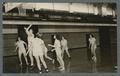 Women playing basketball in Women's Building, 1940