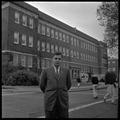 Gary Ford, a member of OSU's G.E. College Bowl team, posing outside of the Commerce Building