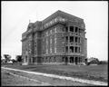 Sister's Hospital, Vancouver, WA. Nearly completed brick building, sidewalk in foreground.