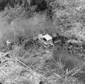 Cat tractor in the Big Creek tributary of the Smith River