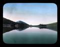 Reflection of old batch across large green lake, where lake and sky nearly meet, Deschutes, N. F.