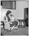 Home management house "practice baby," December 1955