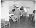 Studying in the new men's residence co-op, September 1954