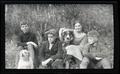 Finley and Morgan children with two dogs and a snake
