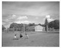 Azalea House, lower campus, and gates, June 7, 1954