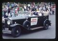 G. Burton Wood driving Grand Marshalls  A. L. Strand and Mollie Strand in bicentennial celebration parade, Corvallis, Oregon, 1976